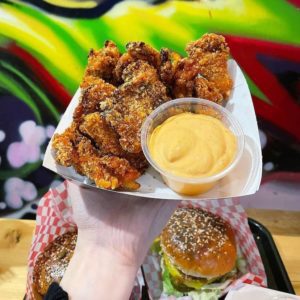 Magic mushroom bites with mayo sauce in a colourful background 