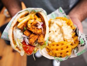 A vegan kebab with fries and loaded fries from what the pitta - fast food london